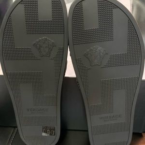 Versace sandals. Pool side they are sizes men 9